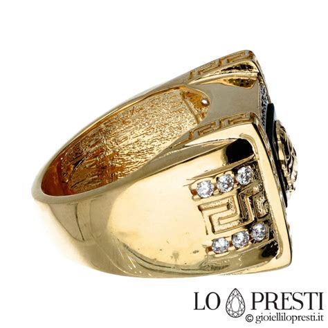 anillo versace oro 18k